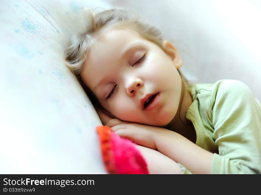 An image of a little girl sleeping