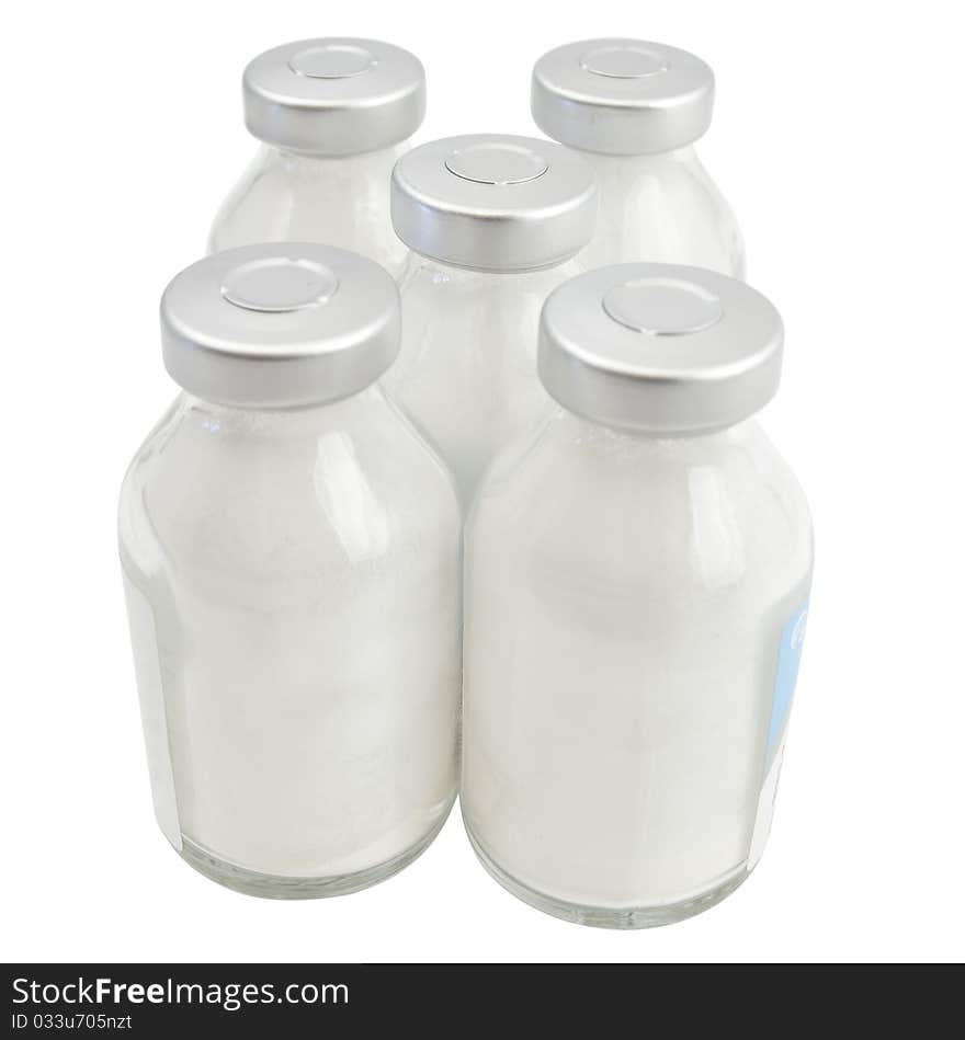 Vials of medicine on a white background