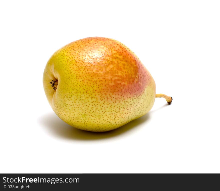 Ripe pear closeup isolated on white background. Ripe pear closeup isolated on white background.