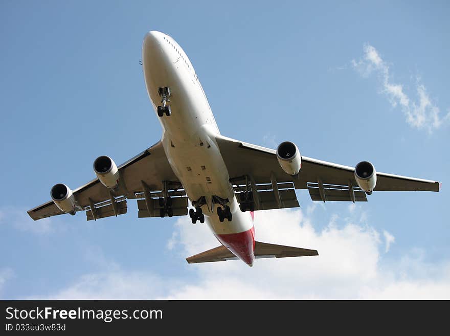 Large passenger aircraft from below. Large passenger aircraft from below