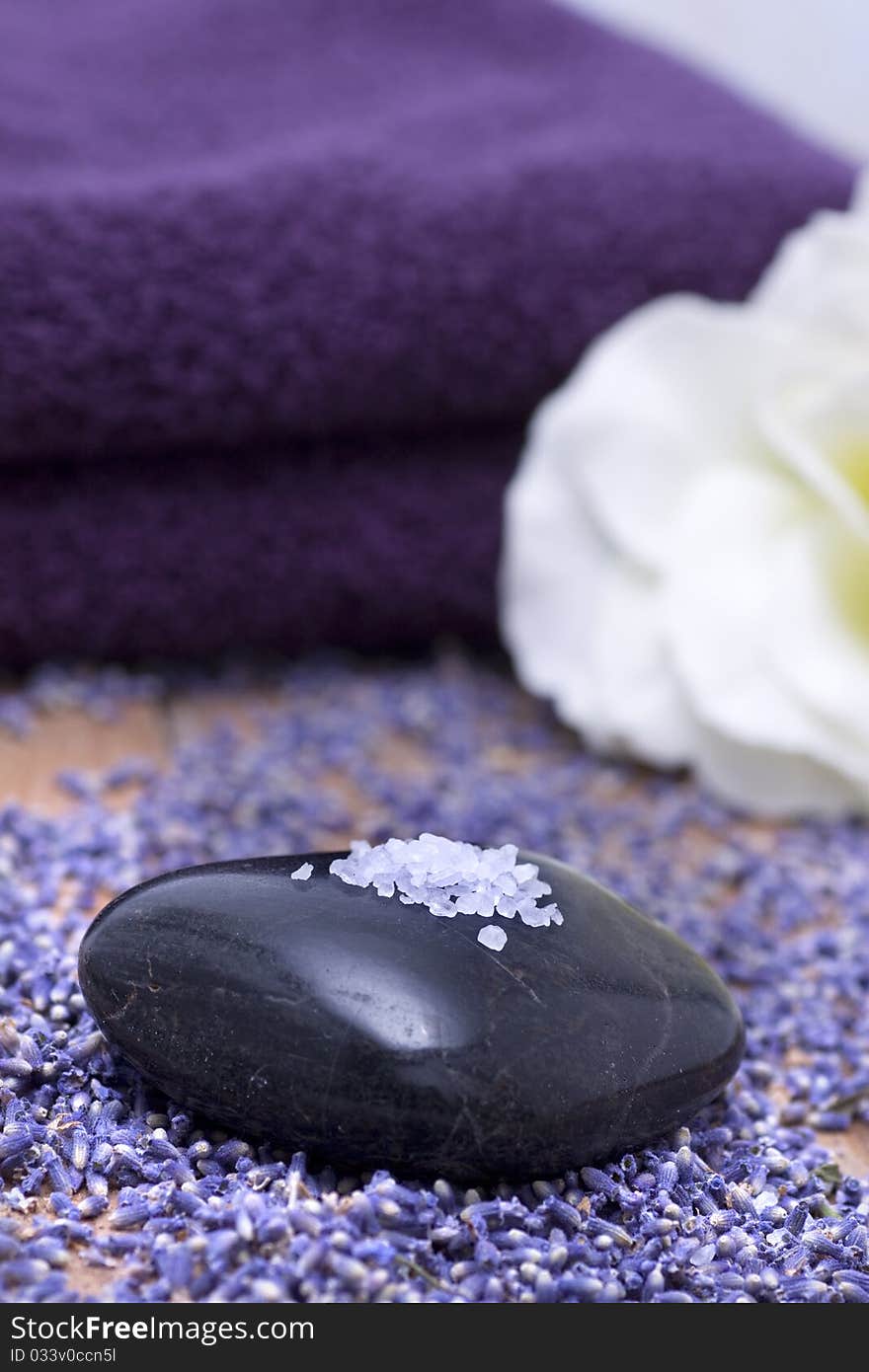 Luxury with lavender bath salts on black stone. Luxury with lavender bath salts on black stone