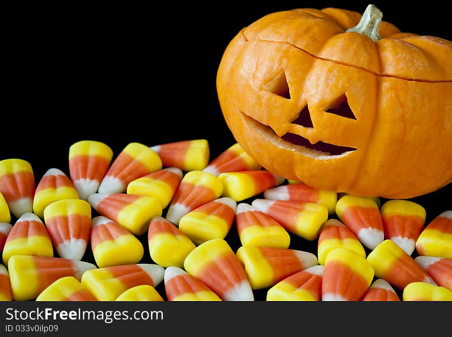 Jack-o-lantern with Candy Corn on Black