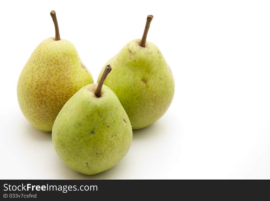 Refine pears with stem onto white background