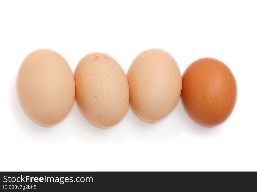 Raw eggs on white background