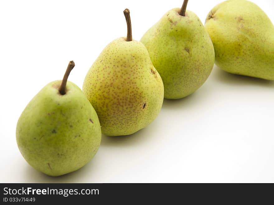 Refine pears with stem onto white background