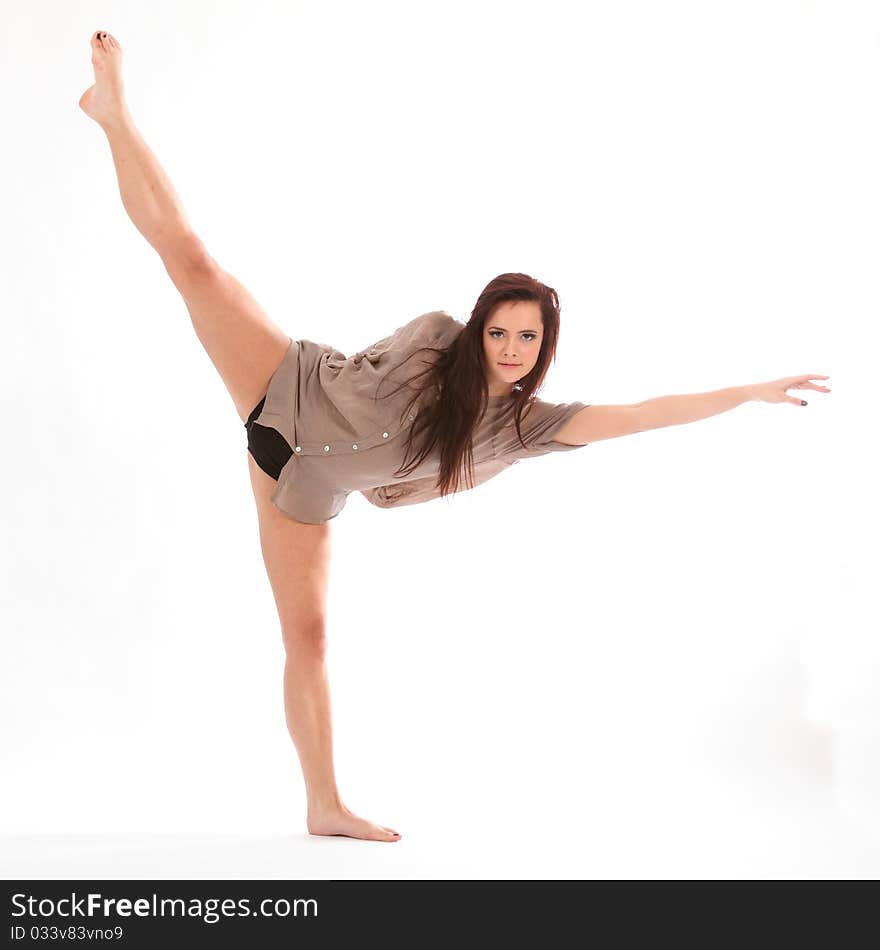 Dramatic gymnastic dance move by young girl