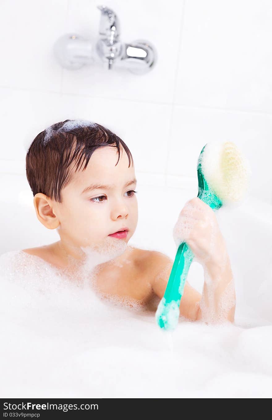 Boy taking a bath