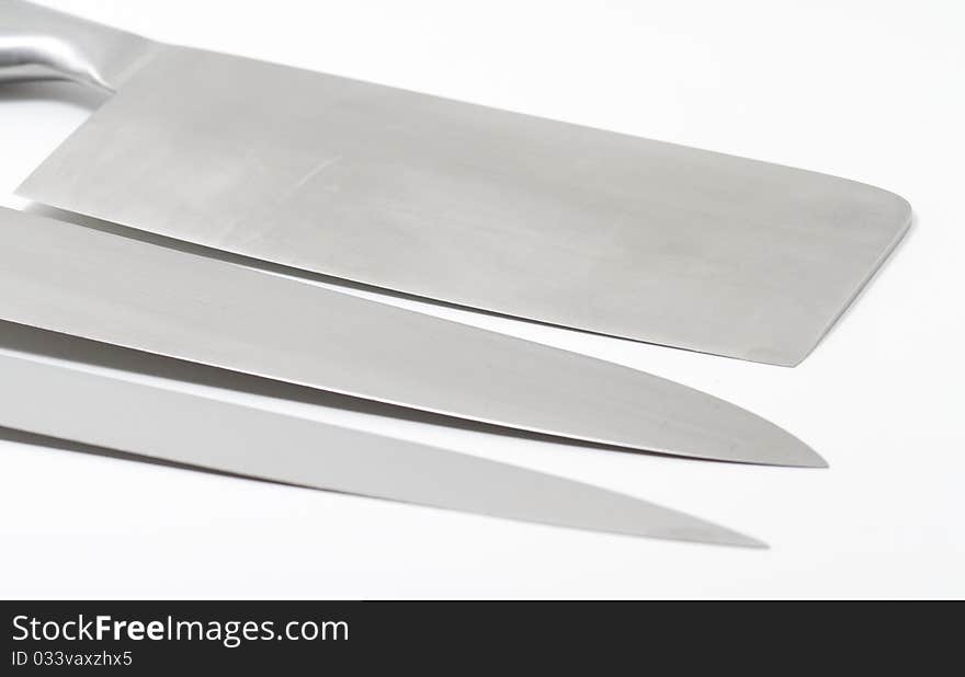 Three kitchen knifes isolated in a white background. Three kitchen knifes isolated in a white background