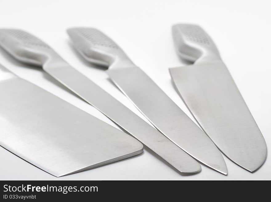 Three kitchen knifes isolated in a white background. Three kitchen knifes isolated in a white background