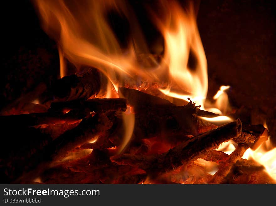 Flaring fire on a black background. Flaring fire on a black background