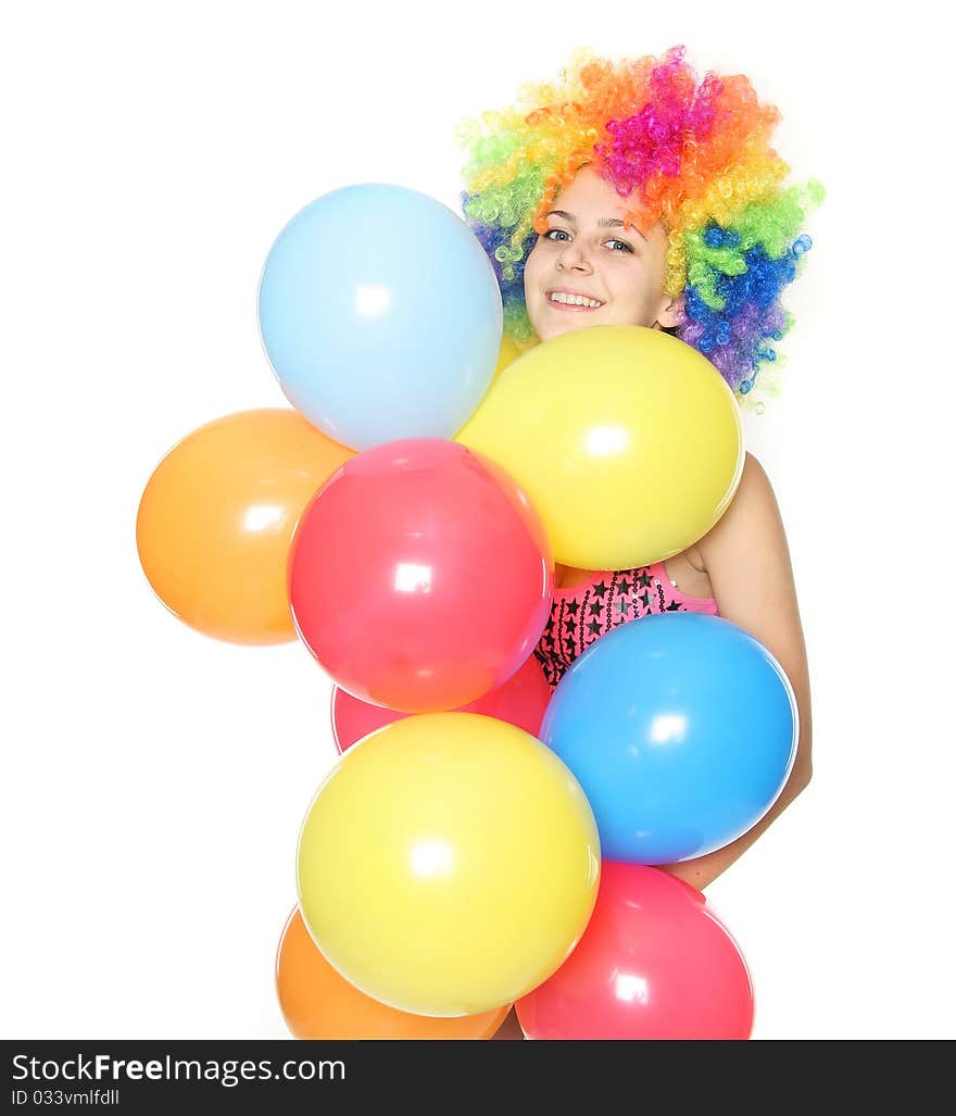 Funny woman with colorful balloons over white