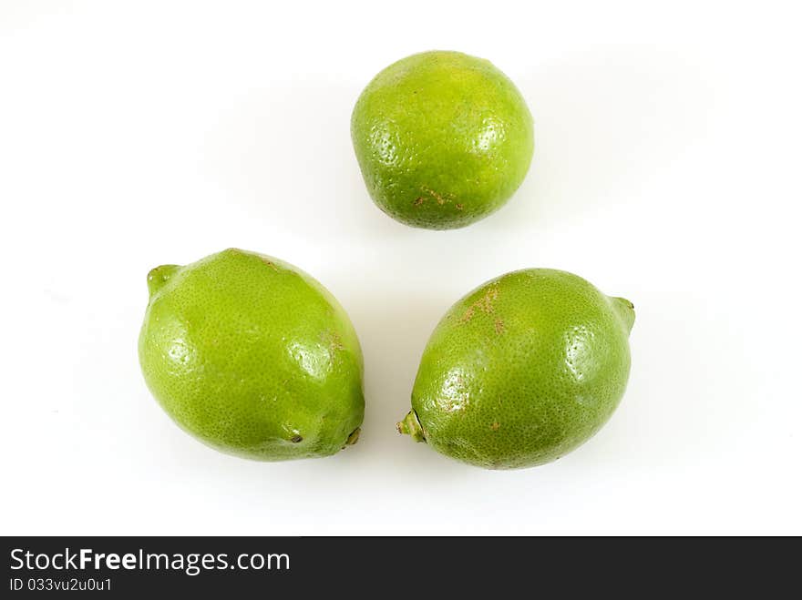 Three lemons isolated on white background