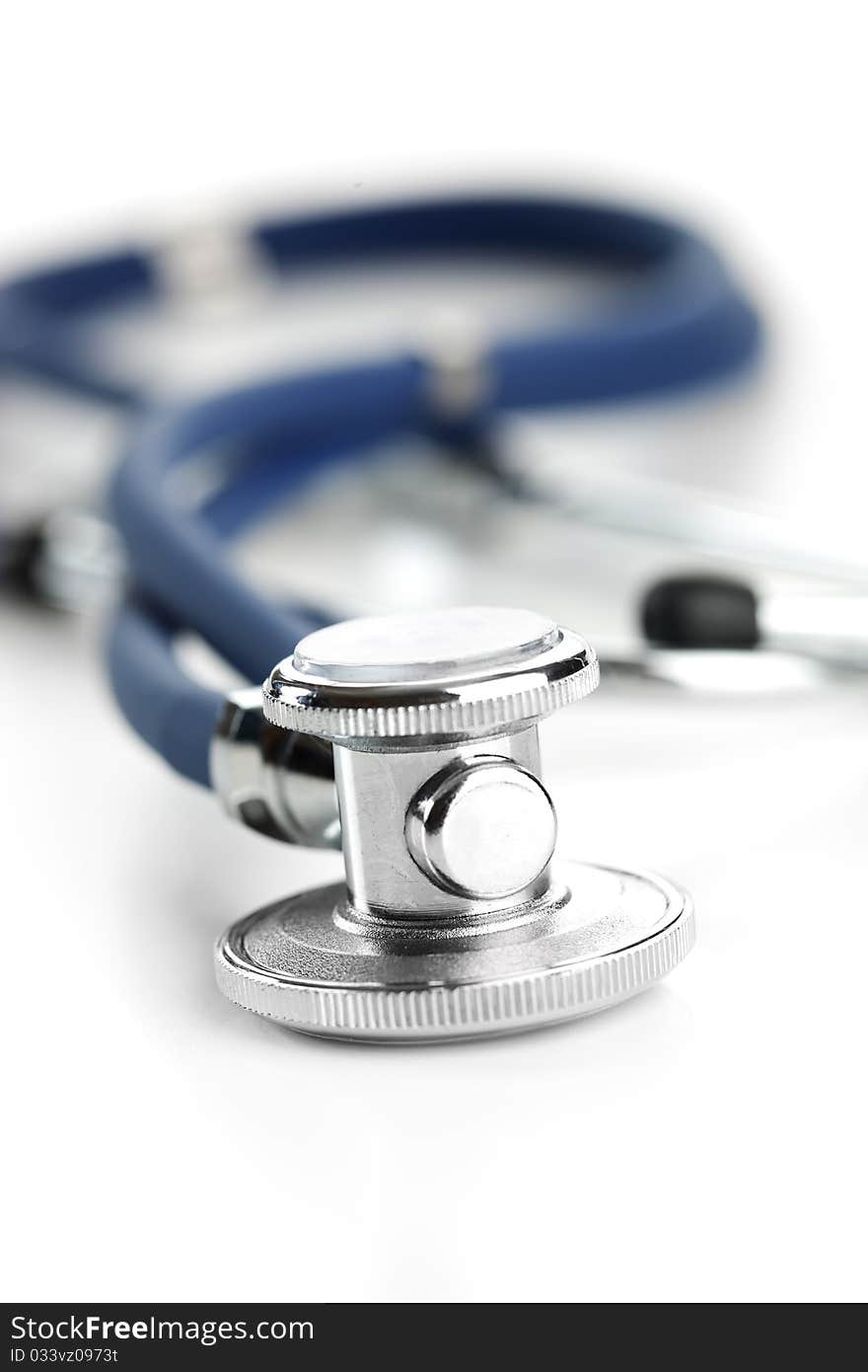 Blue stethoscope on a white background