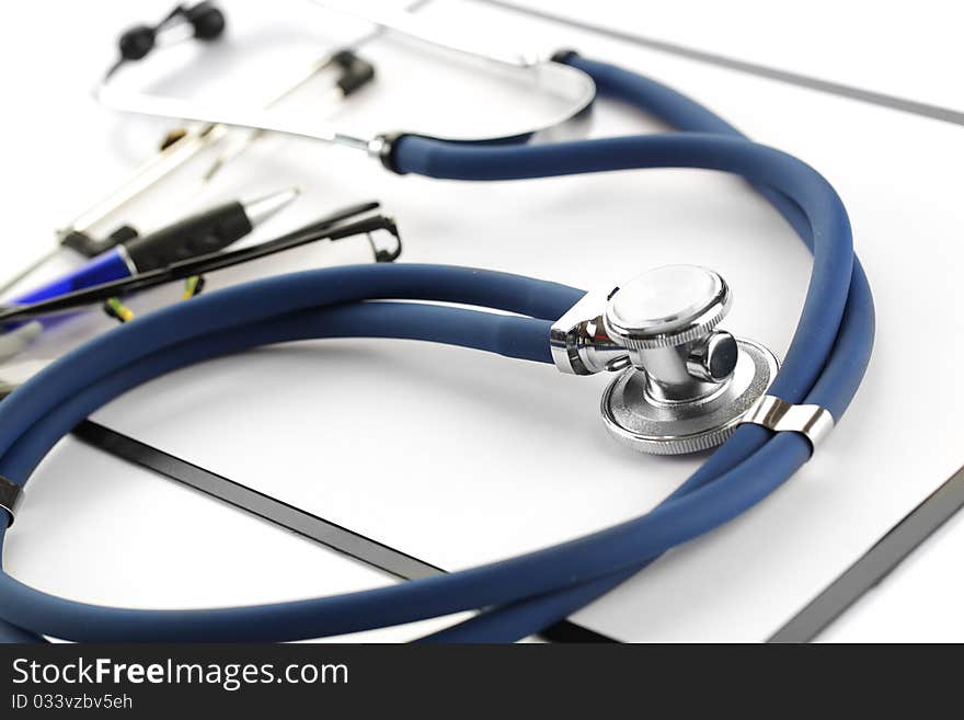 Blue stethoscope on a white background