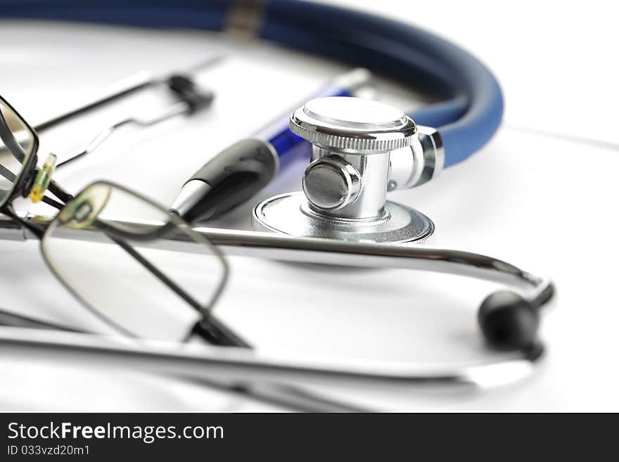 Blue stethoscope on a white background