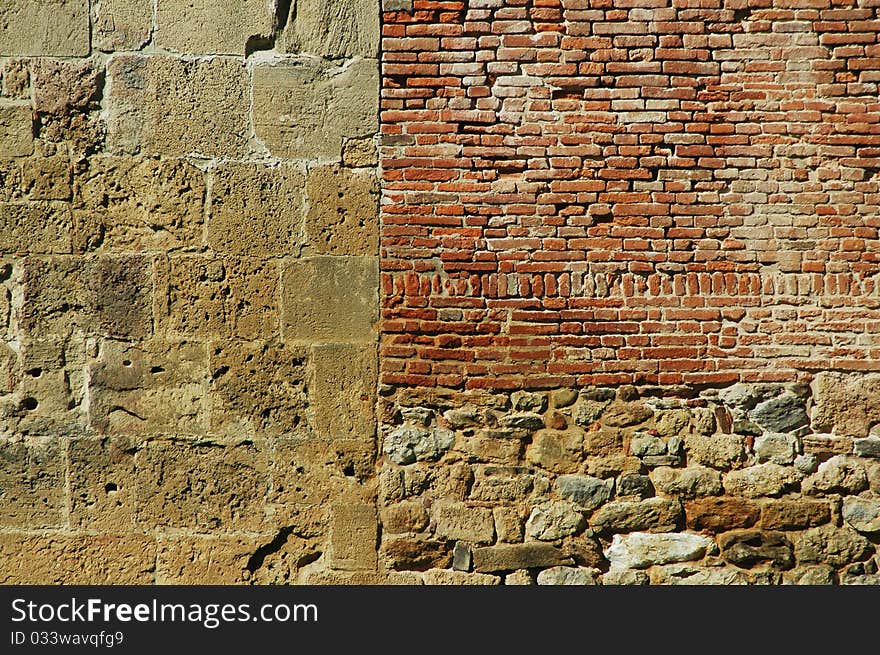 Stone wall for background with stones and bricks