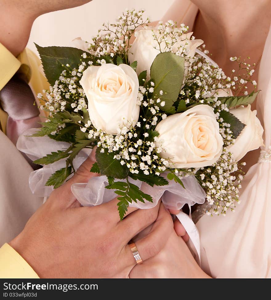 Wedding flowers lying on wood floor