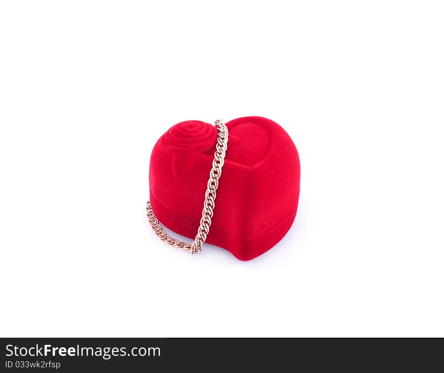 Gold bracelet and red gift packing , isolated white background.