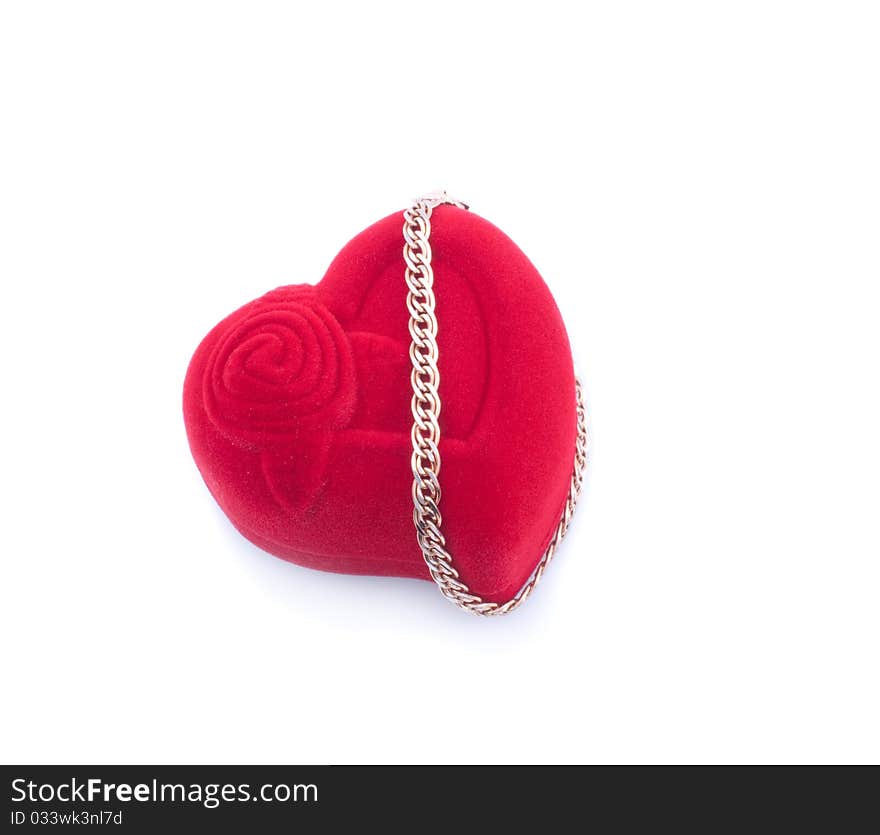 Gold bracelet and red gift packing , isolated white background.