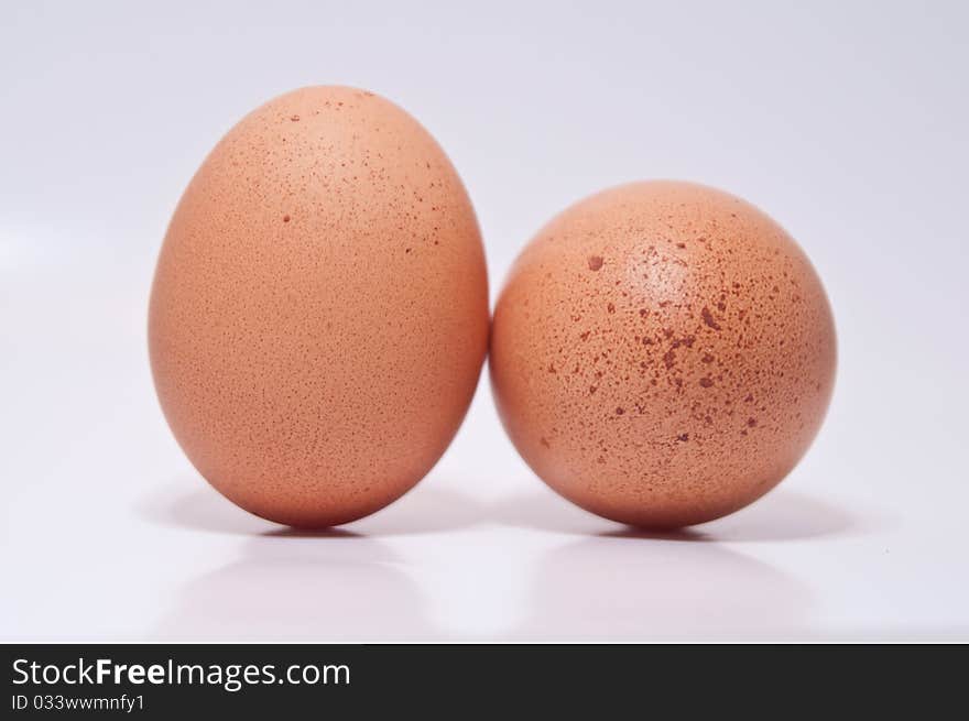 Two eggs isolated on a white background