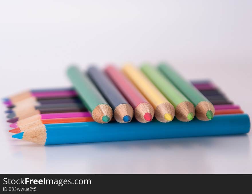 Group of color pencils isolated on white background