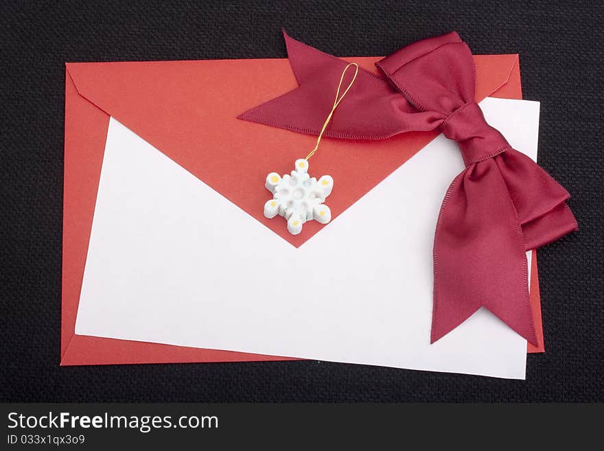 Congratulatory letter with a red envelope and a scarlet ribbon.