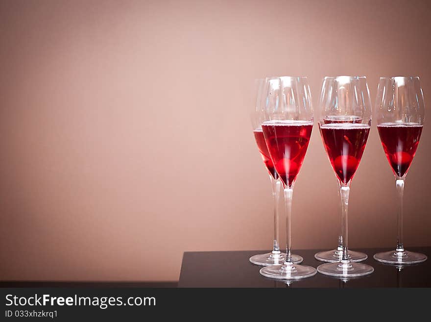 Champagne glasses with a cherry