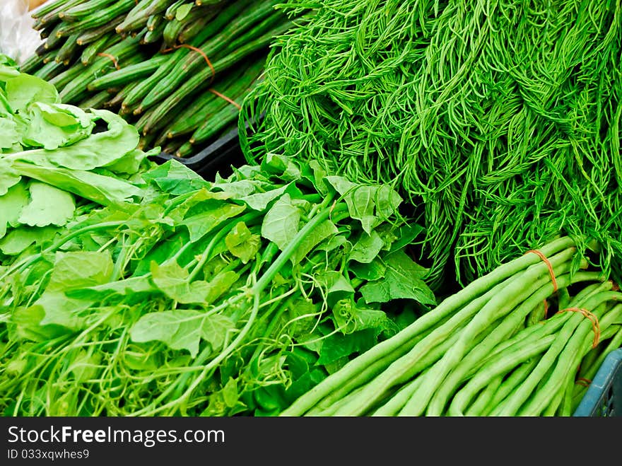 Variety of fresh vegetables in market closeup background , Asia , Thailand