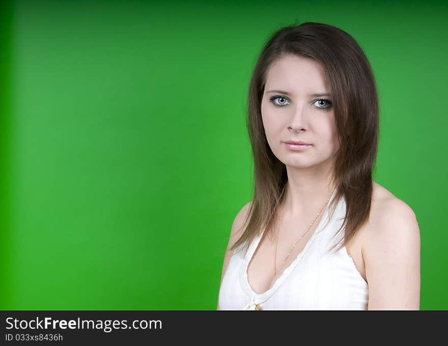 Girl on a green background isolated