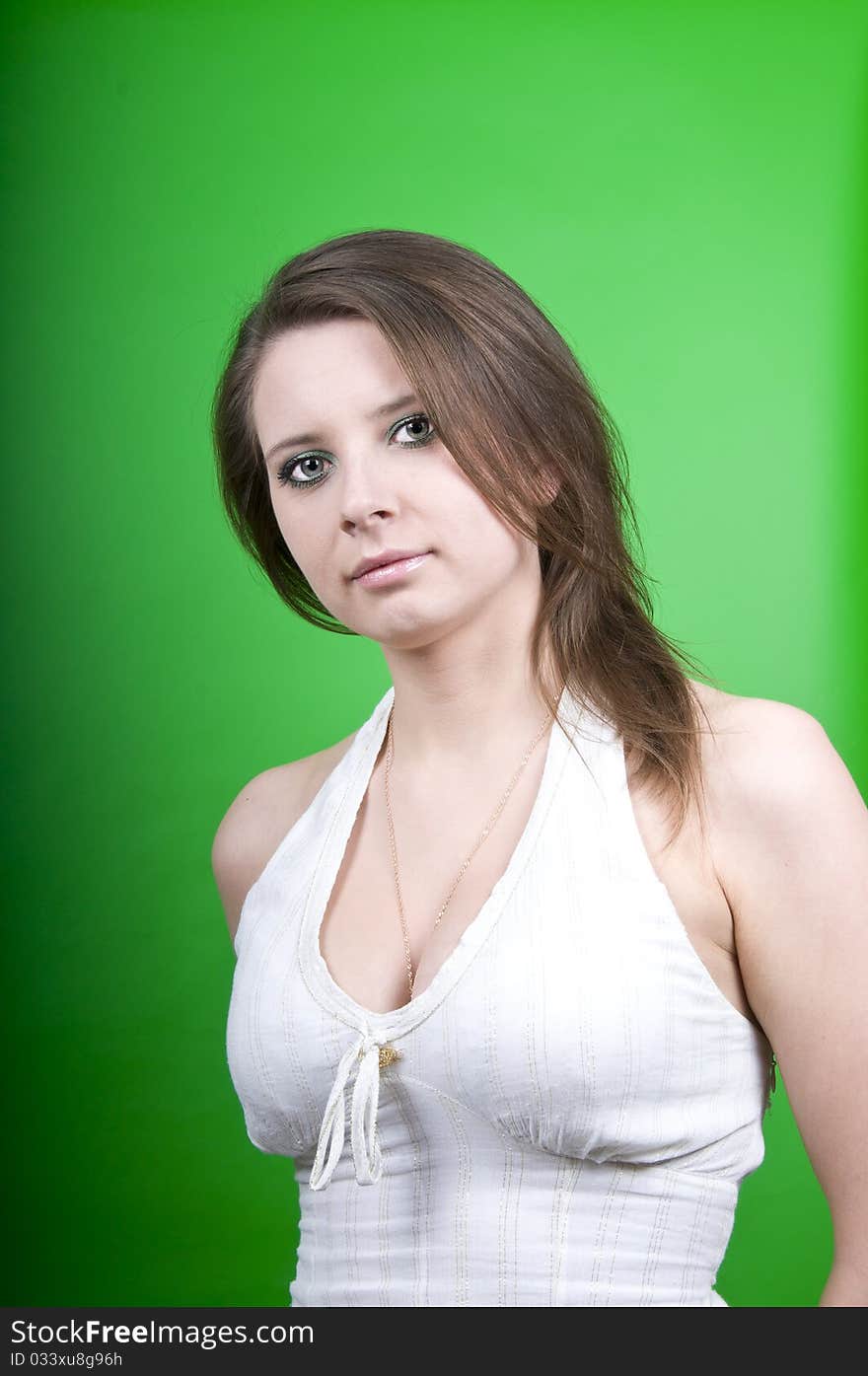 Girl on a green background isolated