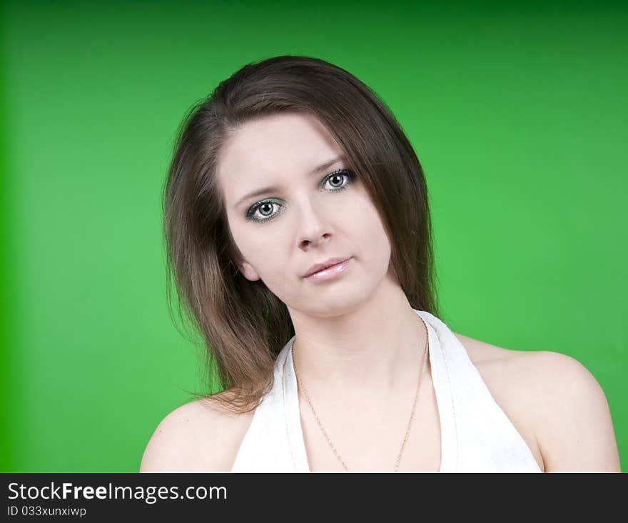 Girl on a green background isolated