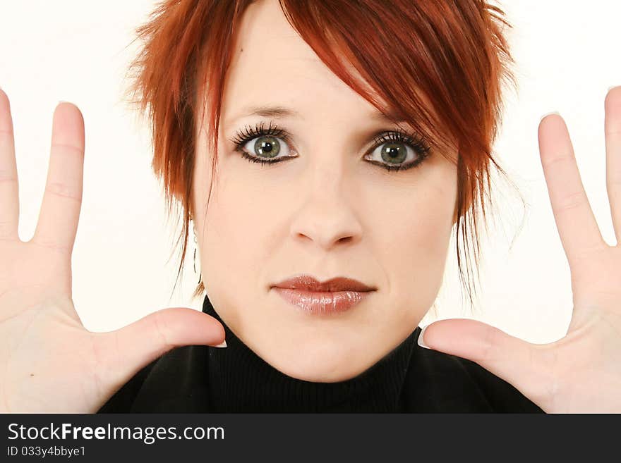 Beautiful 30 year old woman face close up with hands open to side. Beautiful 30 year old woman face close up with hands open to side.