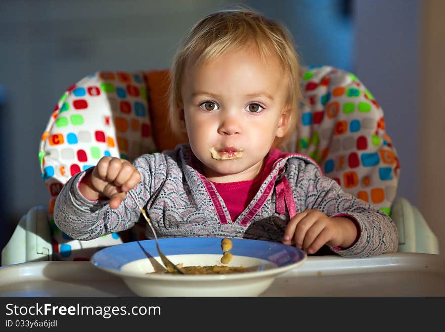 Little Girl Eats Porridge