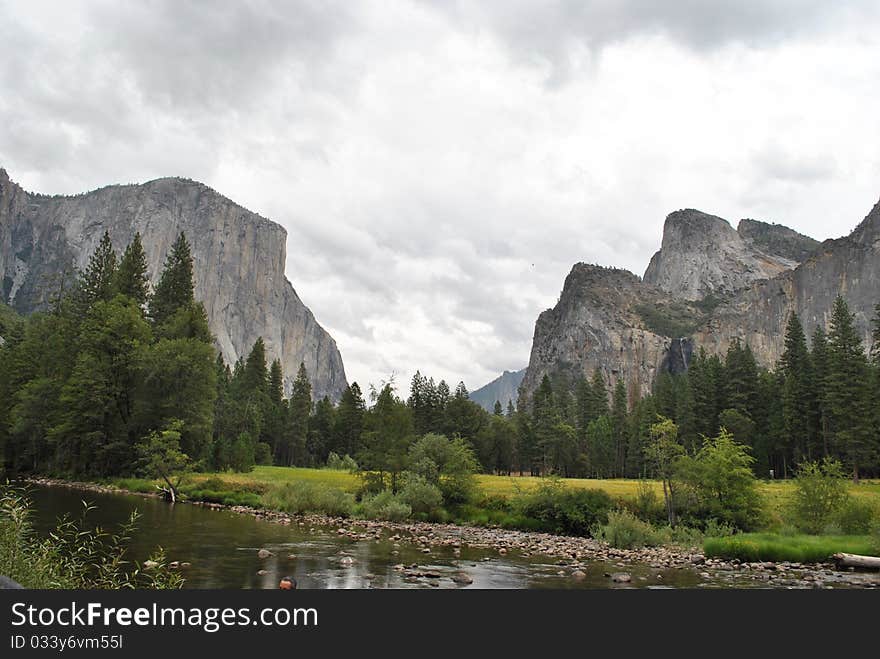 A rare cloudy day in Yosemite makes for a unique view of El Capitan on the left and Bridal Veil Falls on the right. A rare cloudy day in Yosemite makes for a unique view of El Capitan on the left and Bridal Veil Falls on the right.