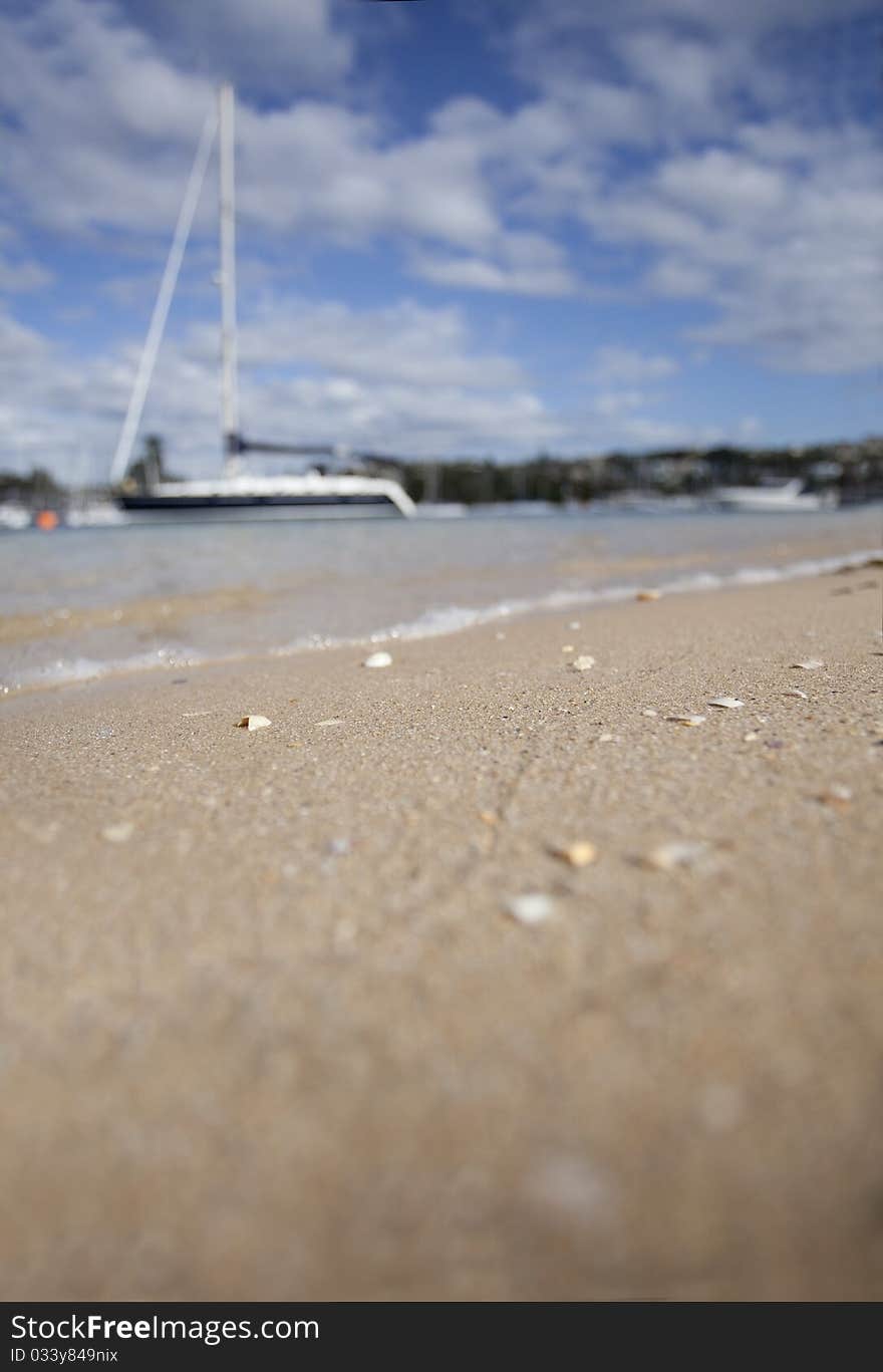 Focus on the sand and sailboats while enjoying the Manly-Spit walk north of Sydney, Australia. Focus on the sand and sailboats while enjoying the Manly-Spit walk north of Sydney, Australia.