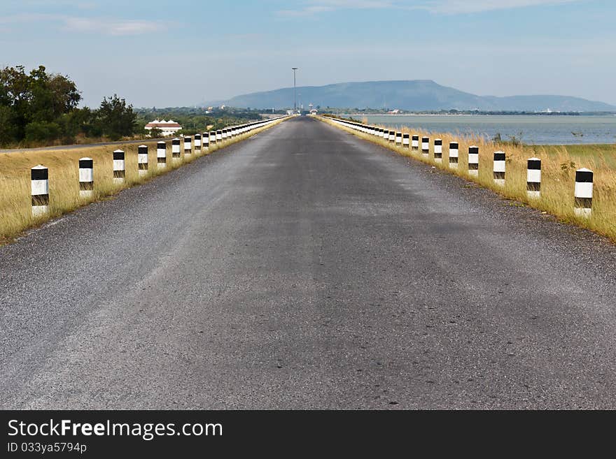 Road asphalt to mountain island. Road asphalt to mountain island