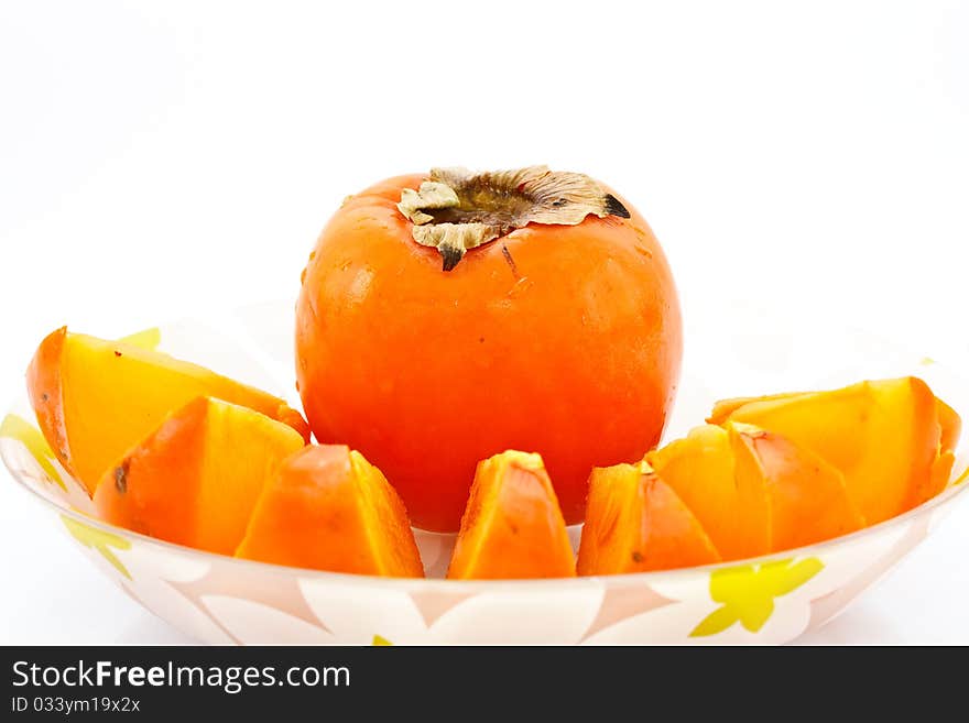 Persimmon in a dish