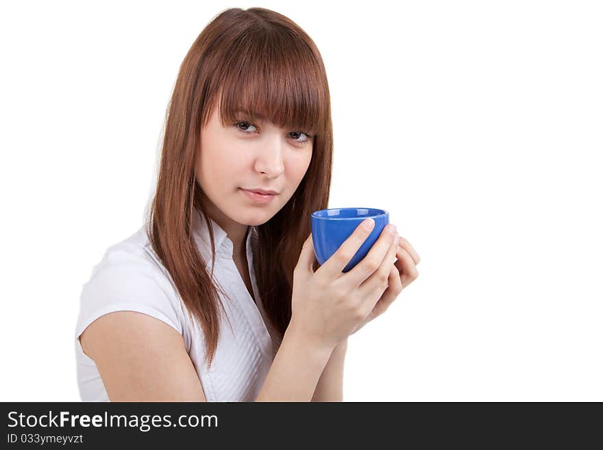 The beautiful girl with a dark blue cup. The beautiful girl with a dark blue cup