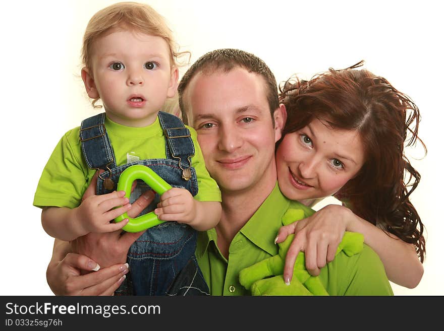 Happy young family isolated on white