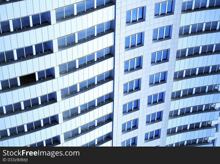 Closeup of modern building wall with many windows. Closeup of modern building wall with many windows