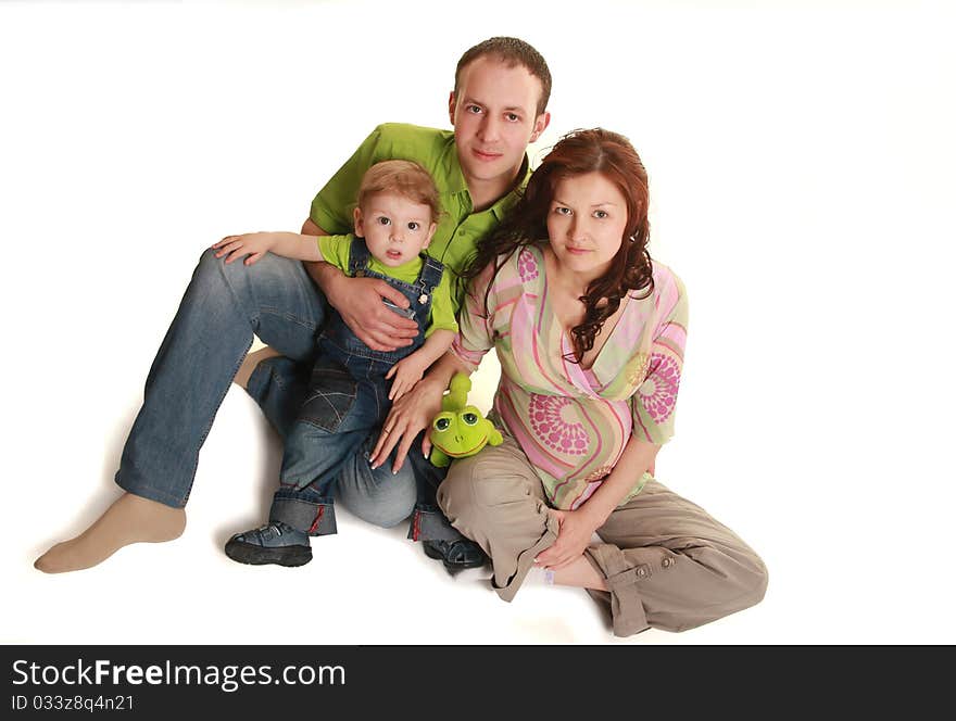 Happy young family isolated on white. Happy young family isolated on white