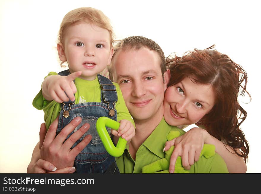 Beautiful young happy family isolated on white. Beautiful young happy family isolated on white