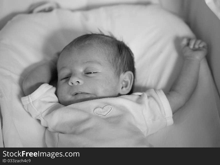 Newborn Baby Girl in the Bed