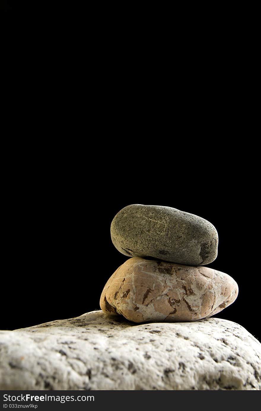 Stones in studio, with black background. Stones in studio, with black background