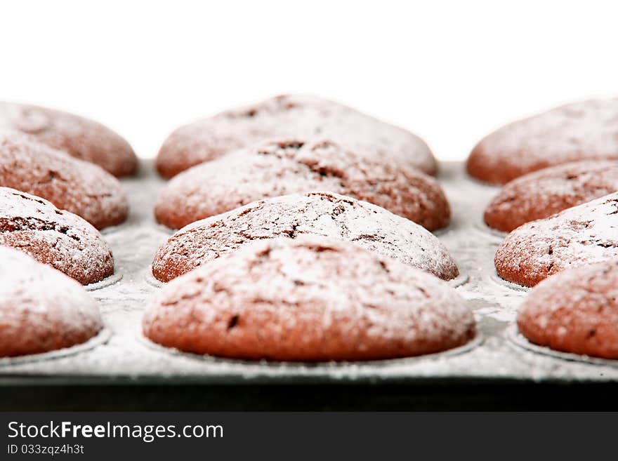 Chocolate muffins in baking tray