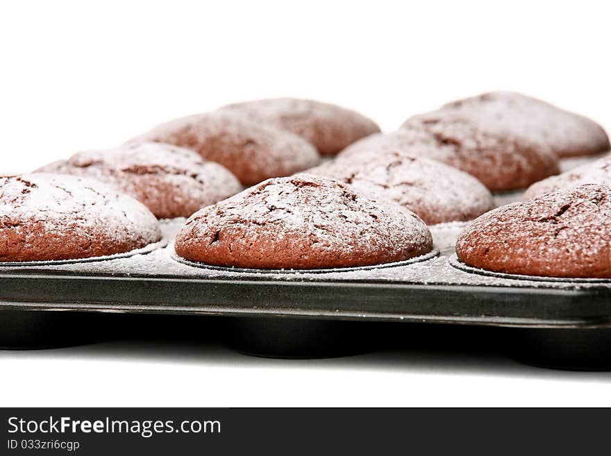 Chocolate muffins in baking tray