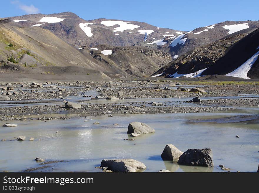 Crossing creek in volcanic mountains,. Crossing creek in volcanic mountains,