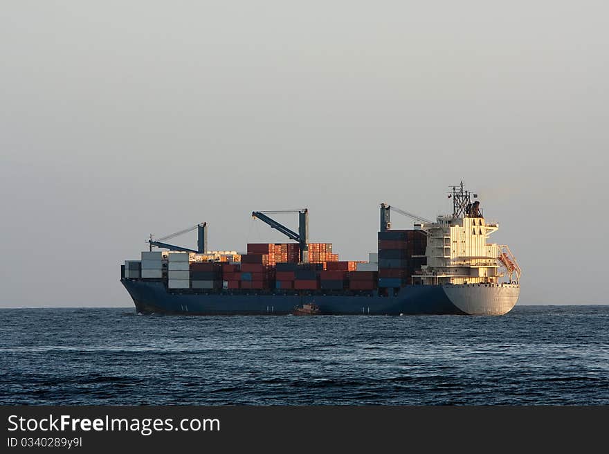 Container cargo ship at sea.