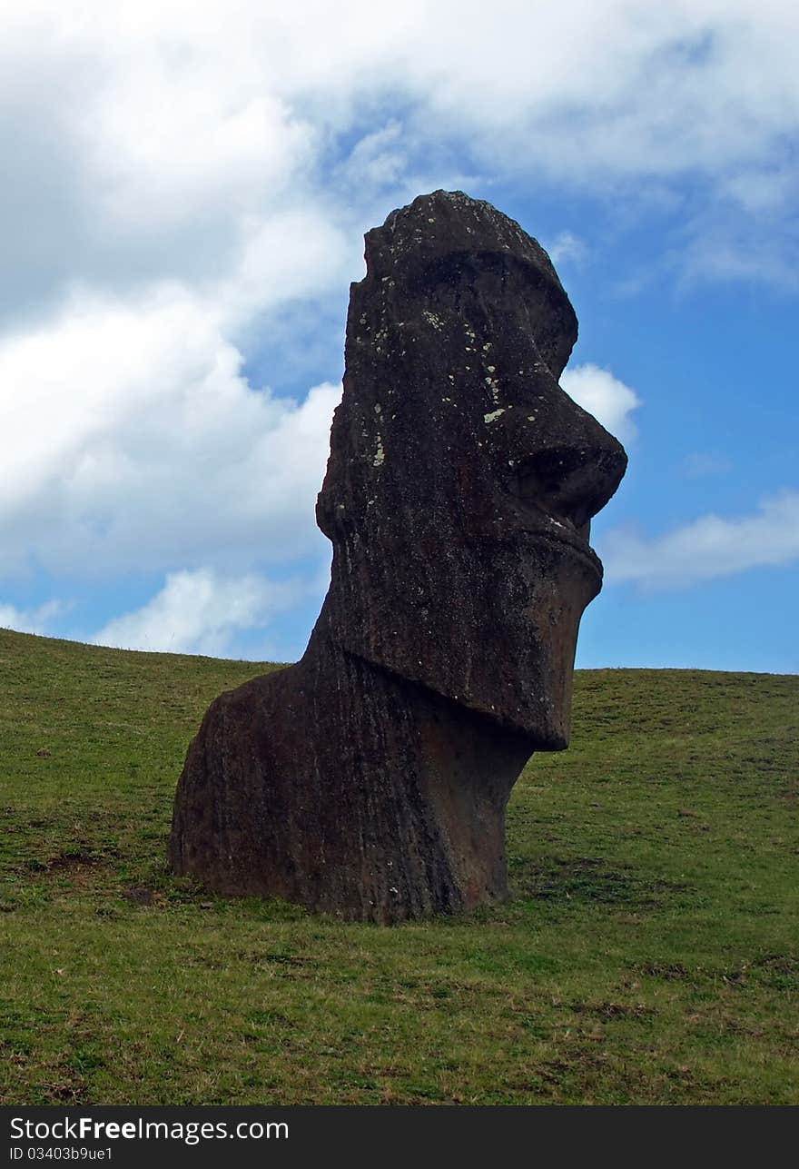 A Moai in Rano Raraku, Easter Island, Chile. A Moai in Rano Raraku, Easter Island, Chile.