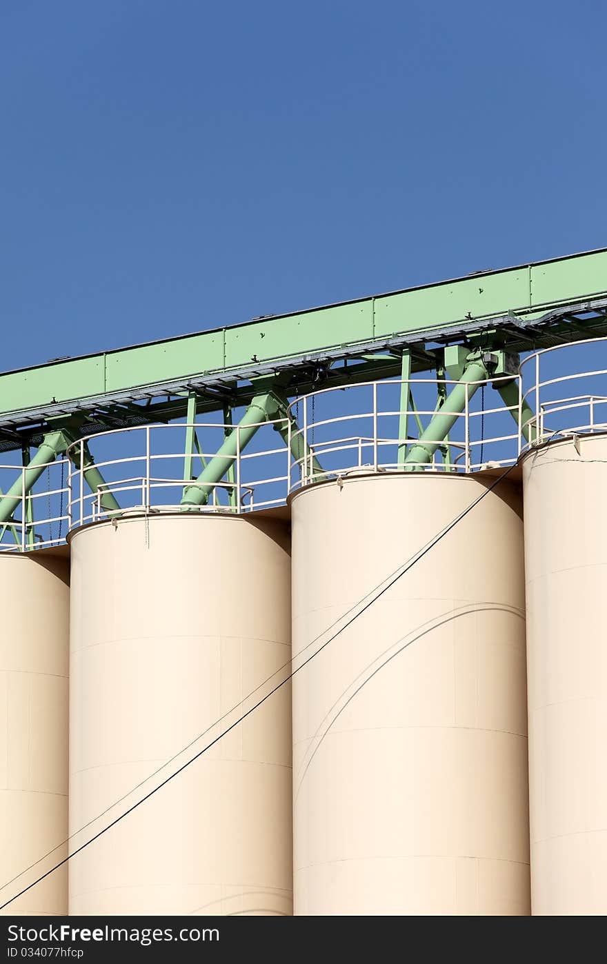 Steel silo and blue sky